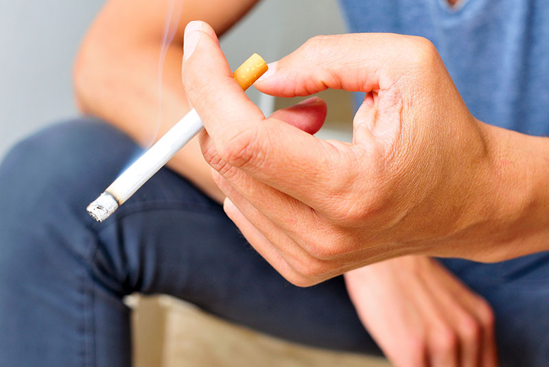 man smoking bad habit