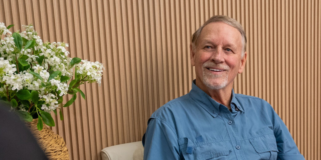 man with blue polo during consult