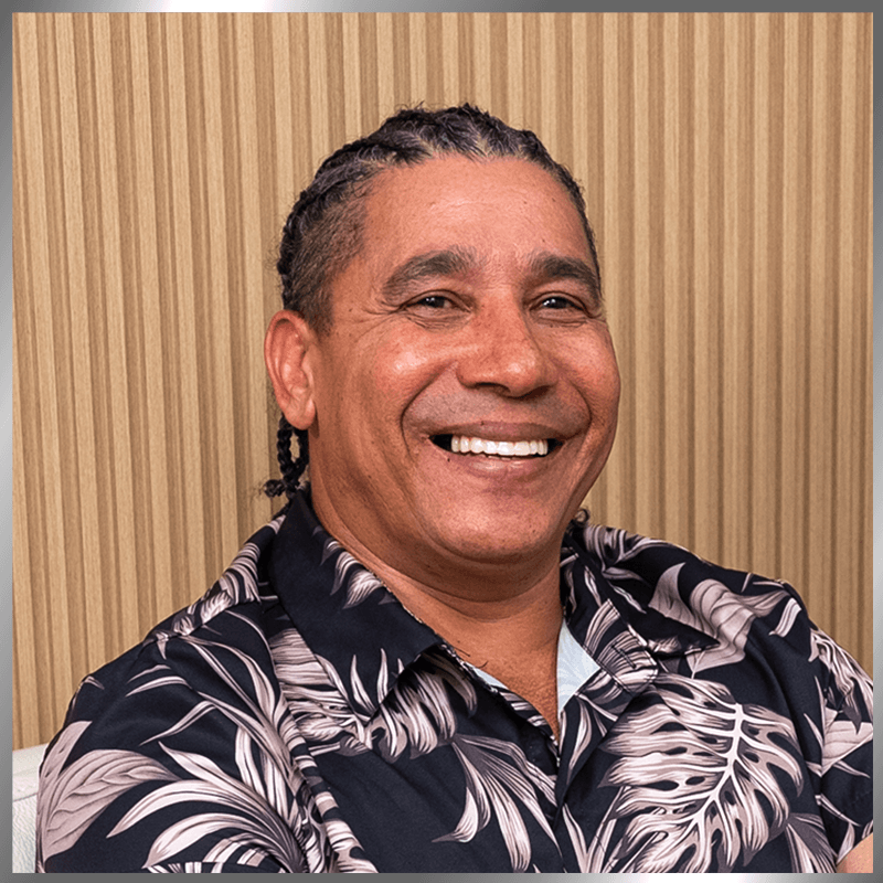 man with braids new smile